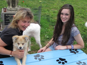 Lorraine Zdeb owner of Love Your Pet, pet sitters of Manville, NJ mentors Girl Scout on dog park project at colonial park